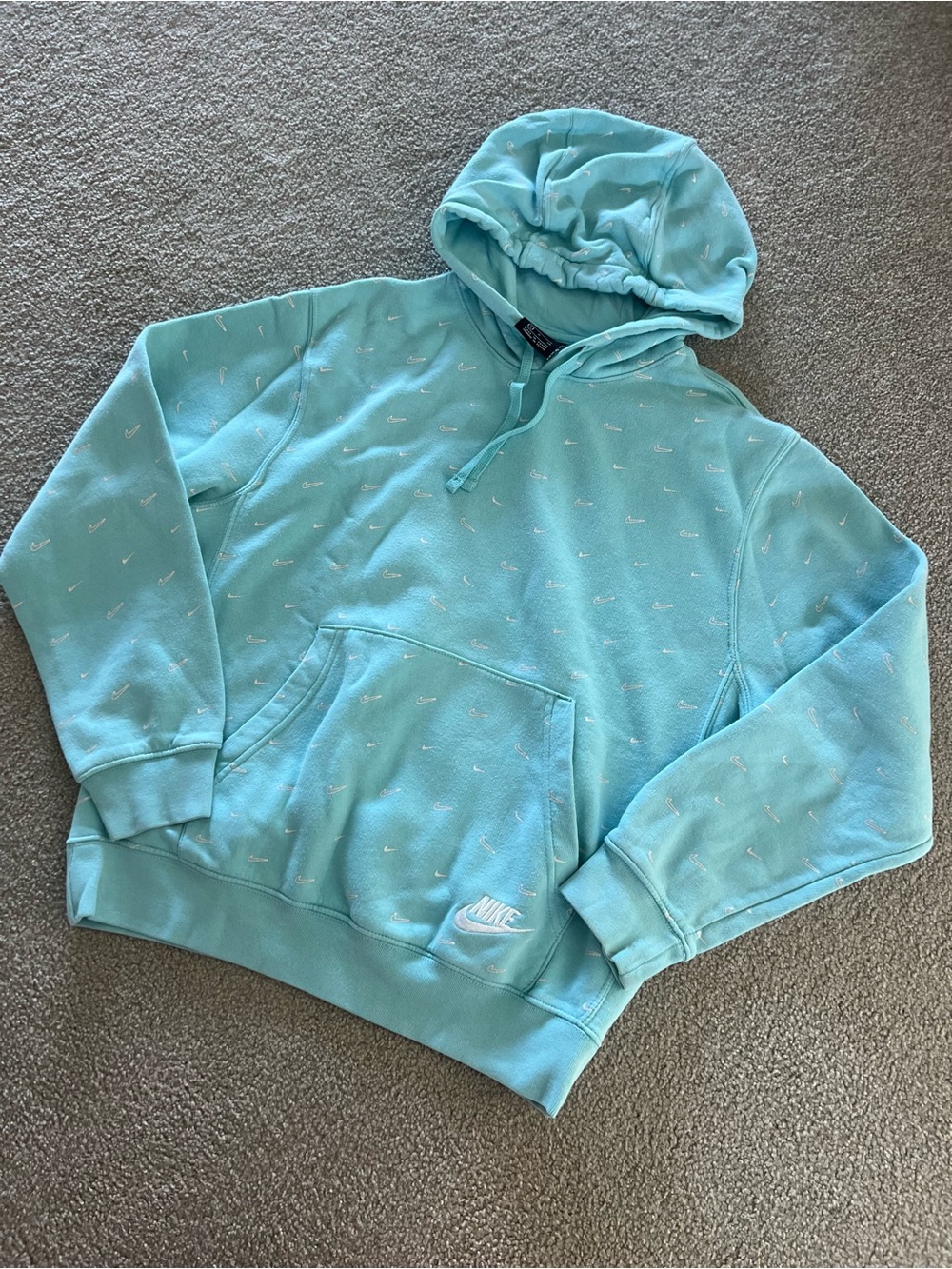 Nike Teal Hoodie with White Micro Swoosh Pattern